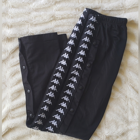 KAPPA SIZE xsmall black tear away track pants. 31 length Snap
